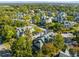 Expansive aerial view displays the neighborhood's verdant landscaping, and cohesive architectural design at 6178 Westgate Dr # 304, Orlando, FL 32835