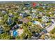 An aerial view highlights the property's location within the community near the tennis courts and lake at 6178 Westgate Dr # 304, Orlando, FL 32835