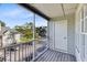 Private screened balcony overlooking a well-maintained neighborhood at 6178 Westgate Dr # 304, Orlando, FL 32835