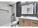Modern bathroom featuring updated vanity and tile shower at 6178 Westgate Dr # 304, Orlando, FL 32835