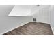 Bright bedroom featuring wood-look floors, and a closet, ready for your personal touch at 6178 Westgate Dr # 304, Orlando, FL 32835