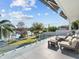 Stunning lake view from the balcony with ample seating at 641 Lake Catherine Dr, Maitland, FL 32751