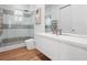 Contemporary bathroom features sleek vanity, modern fixtures, and glass-enclosed shower at 641 Lake Catherine Dr, Maitland, FL 32751
