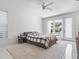 Inviting bedroom with a comfortable bed, ample natural light, and a calming color palette at 641 Lake Catherine Dr, Maitland, FL 32751