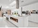 Sleek, modern kitchen featuring stainless steel appliances, a large island, and ample storage at 641 Lake Catherine Dr, Maitland, FL 32751