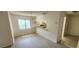 Open dining area adjacent to the kitchen, featuring modern flooring and ample natural light at 658 Olympic Dr, Ocoee, FL 34761