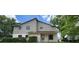 Inviting two-story home showcasing neat landscaping and a well-kept facade at 658 Olympic Dr, Ocoee, FL 34761