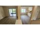 Bright living room featuring an open floorplan, wood flooring and view to lanai at 658 Olympic Dr, Ocoee, FL 34761