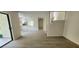 Bright living room featuring an open floorplan, wood flooring and a staircase to the second story at 658 Olympic Dr, Ocoee, FL 34761