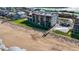 Beachfront condo building with a swimming pool and private beach access at 6727 Turtlemound Rd # 417, New Smyrna Beach, FL 32169