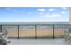 Beautiful view from the balcony, with seating overlooking the beach and ocean at 6727 Turtlemound Rd # 417, New Smyrna Beach, FL 32169