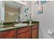 Bathroom featuring a vanity with a stone countertop and glass-enclosed shower at 8000 Tuscany Way # 4405, Davenport, FL 33896