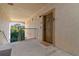 Condo hallway with entrance door, outdoor view and stair access at 8000 Tuscany Way # 4405, Davenport, FL 33896
