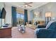 Cozy living room features comfortable seating and balcony access at 8000 Tuscany Way # 4405, Davenport, FL 33896