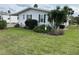Charming single-story home with well-maintained landscaping and attractive curb appeal at 103 Dreama Dr, Davenport, FL 33897