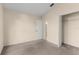 Neutral bedroom featuring carpeted floors and a closet with a simple, clean design at 113 Glasgow Ct, Davenport, FL 33897