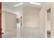 Spacious living room with tile floors and neutral-colored walls at 113 Glasgow Ct, Davenport, FL 33897
