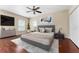 Serene bedroom features a comfortable queen-sized bed, modern furnishings, and plenty of natural light, perfect for relaxation at 1132 Hardy Ave Ave, Orlando, FL 32803