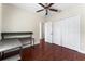 Bedroom featuring hard wood floors, ceiling fan and closet at 1132 Hardy Ave Ave, Orlando, FL 32803