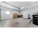 Spacious garage with painted walls, concrete floor, and garage door opener at 1132 Hardy Ave Ave, Orlando, FL 32803