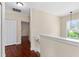 Hallway area leading to bedrooms with wood flooring at 1132 Hardy Ave Ave, Orlando, FL 32803
