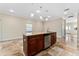 Kitchen island with sink, and stainless steel dishwasher at 1132 Hardy Ave Ave, Orlando, FL 32803