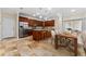 Spacious kitchen features a large island, stainless steel appliances, and a dining area, ideal for entertaining and Gathering meals at 1132 Hardy Ave Ave, Orlando, FL 32803