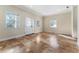 Inviting living room featuring tile floors, recessed lights, and three bright windows at 1132 Hardy Ave Ave, Orlando, FL 32803