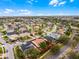 An aerial view highlights the property's location within a neighborhood at 13506 Crystal River Dr, Orlando, FL 32828
