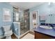 Bathroom features a glass enclosed shower, a window for natural light, and a modern sink at 13506 Crystal River Dr, Orlando, FL 32828