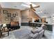 Cozy living room with ceiling fan and breakfast bar, providing ample space for entertainment at 13506 Crystal River Dr, Orlando, FL 32828