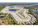 An aerial view of a Primary-planned community featuring well-maintained homes surrounding two beautiful lakes at 1382 Hayton Ave, Deland, FL 32724
