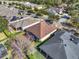 Aerial view of backyard with screened-in porch in a well-defined yard at 1382 Hayton Ave, Deland, FL 32724
