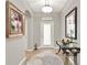 Welcoming foyer with neutral walls, decor, and tile flooring leading into the home at 1382 Hayton Ave, Deland, FL 32724