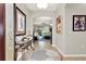 Bright foyer featuring tile floors and decor, flowing into the living space at 1382 Hayton Ave, Deland, FL 32724