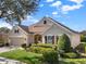 Charming one-story home with lush landscaping and a two-car garage at 1382 Hayton Ave, Deland, FL 32724