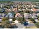 Aerial view of the home with a brick driveway and manicured front yard at 1382 Hayton Ave, Deland, FL 32724