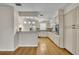 Modern kitchen features stainless steel appliances, granite countertops, and ample cabinet space at 1409 Overlake Ave, Orlando, FL 32806