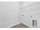 Walk-in closet featuring vinyl flooring and a white wire shelving system for ample storage at 142 Guava Pass, Ocklawaha, FL 32179
