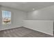 Bedroom featuring neutral carpet and large window providing natural light at 18058 Cider Mill Ln, Winter Garden, FL 34787