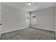 Bedroom with neutral carpet, grey colored walls and large windows at 18058 Cider Mill Ln, Winter Garden, FL 34787