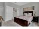 Inviting bedroom with carpet floors, ample closet space, soft decor, and abundant natural light at 18076 Cider Mill Ln, Winter Garden, FL 34787