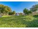 Spacious backyard with lawn and storage shed at 1905 Diamond Dr, Orlando, FL 32807