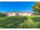 View of a backyard with healthy lawn at 1905 Diamond Dr, Orlando, FL 32807