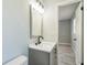 Bathroom featuring vanity with sink, faucet, and a view to the doorway at 1905 Diamond Dr, Orlando, FL 32807