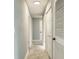 Clean hallway with fresh paint and doors at 1905 Diamond Dr, Orlando, FL 32807