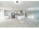 Open concept kitchen with stainless steel appliances, a kitchen island, and lots of cabinet space at 1905 Diamond Dr, Orlando, FL 32807