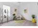 Bright bedroom with stylish decor, ceiling fan, and large window provides ample natural light at 2017 Flora Pass Pl, Kissimmee, FL 34747