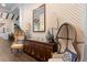 A beautifully furnished lobby showcasing armchairs, a console table, and decorative lamps at 2017 Flora Pass Pl, Kissimmee, FL 34747