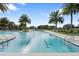 Large outdoor pool featuring shallow entry and lots of open space at 2017 Flora Pass Pl, Kissimmee, FL 34747